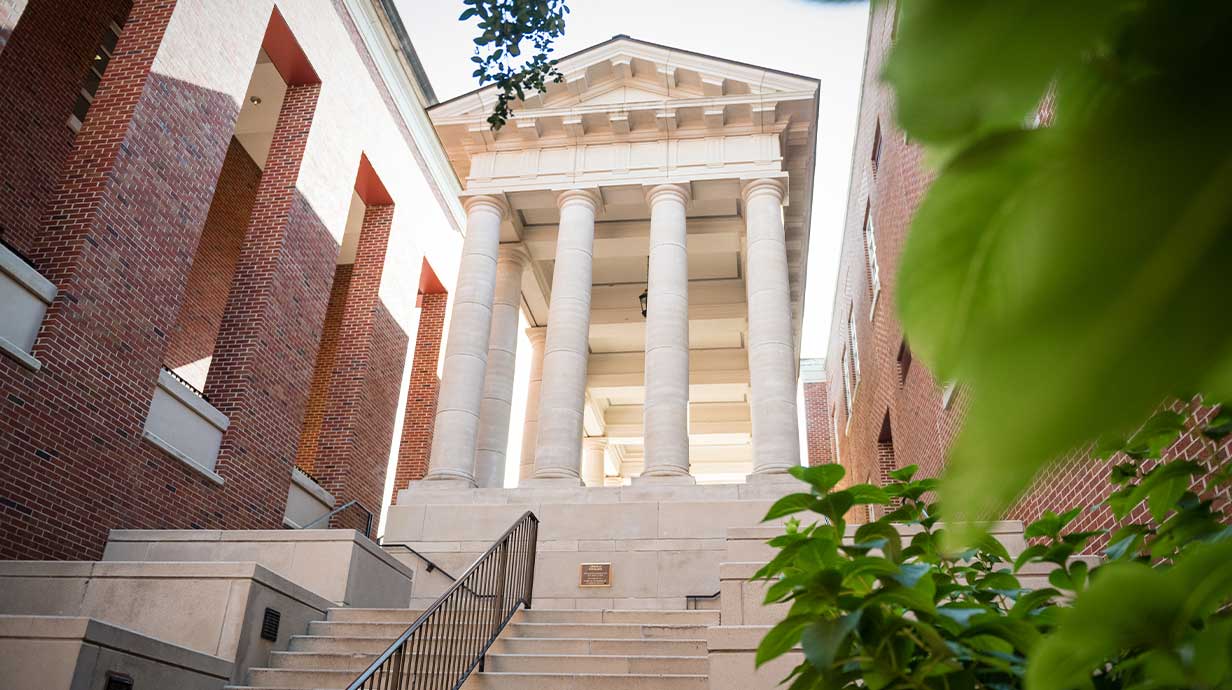 Photo taken from the courtyard of Holman Hall facing the pavilion on Business Row.