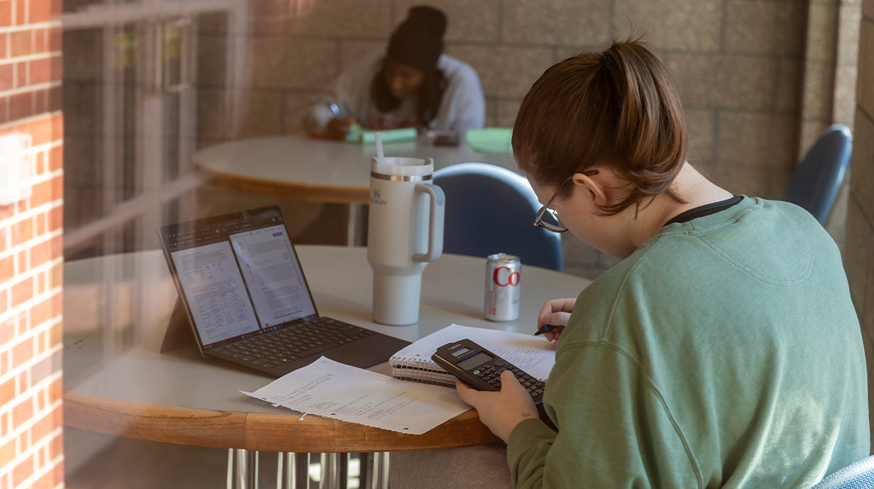 Students studying at tables.