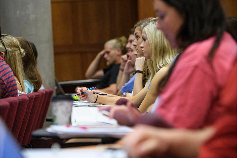 Students in class in the Holman Auditorium.