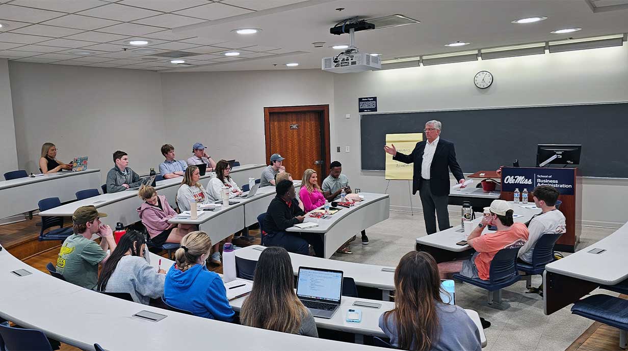 John Berrett, President and CEO of FNB speaking to a group of students during the Business Success program.