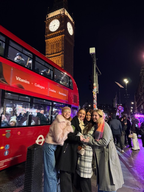 A group photo of four female students in London during a Study Abroad trip.