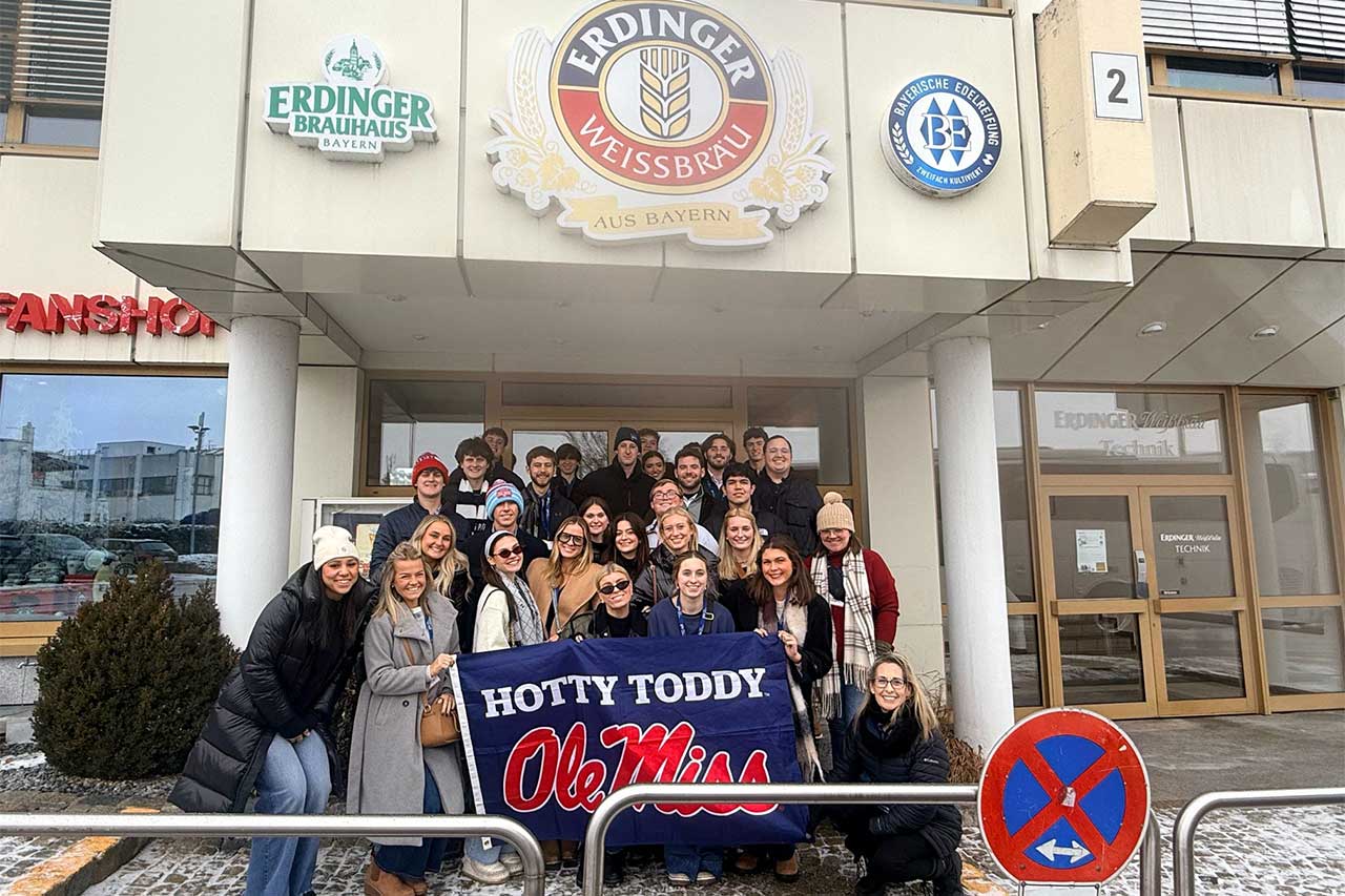 Staff and students pose for a group photo outside Erdinger Weißbräu in Erding, Germany.