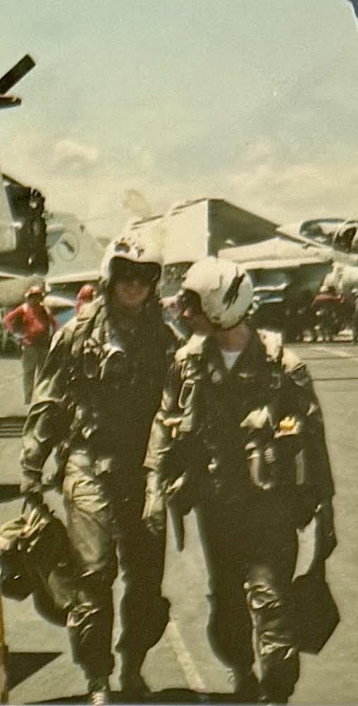 (Two Guys Walking) McPhail (left) walking on the flight deck with fellow pilot, Steve Hoglund, of the USS Saratoga after a flight over Saudi Arabia in November of 1990 during operation Desert Shield.
