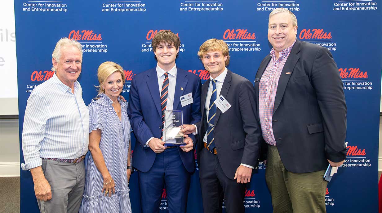 oug and Melanie Wilson pictured with Brett Doherty & McClain Shieltz, founders of Munchies Chicken & Waffles LLC, and Dr. Clay Dibrell. Photo Credit: Joe Worthem