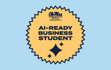 Digital Badge. Text: School of Business logo, "AI-READY BUSINESS STUDENT," and AI spark icon.