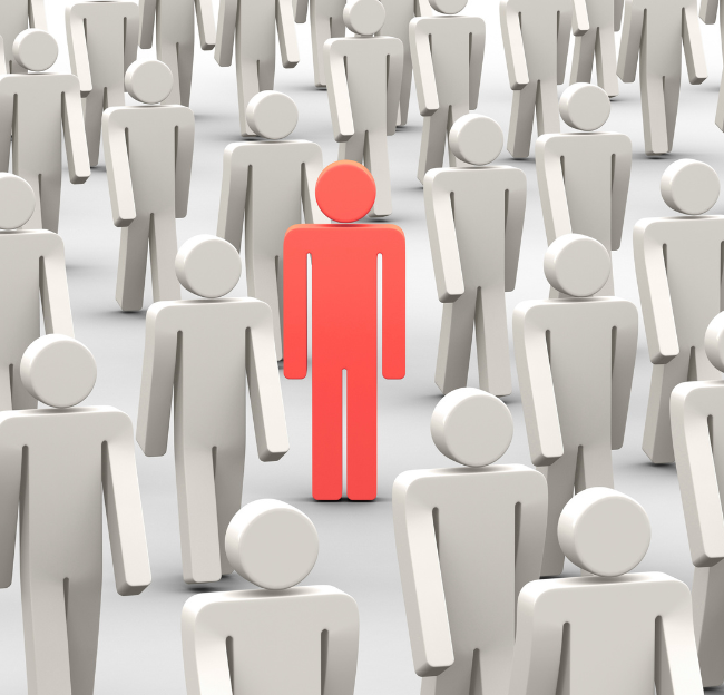 A figure representing a person, stands out from the crowd.