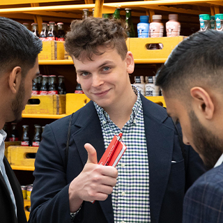 A student giving the thumbs-up during the Career Trek in Atlanta.