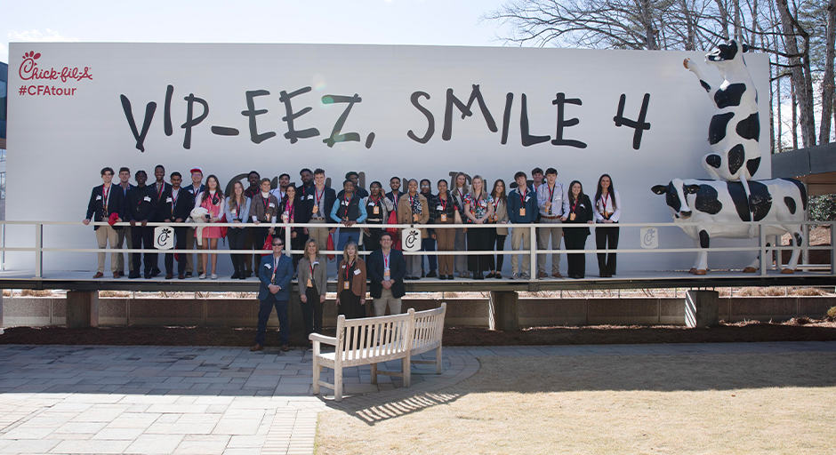 Group photo of students and staff from the Ole Miss Business School at Chick-fil-A's Support Center in Atlanta.