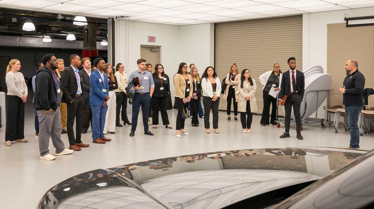 Nissan employee speaking to students at the Nashville, TN location.