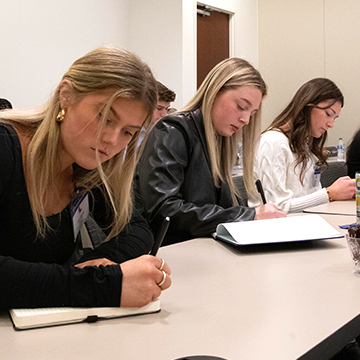 Students taking notes at Northwestern Mutual in Atlanta.